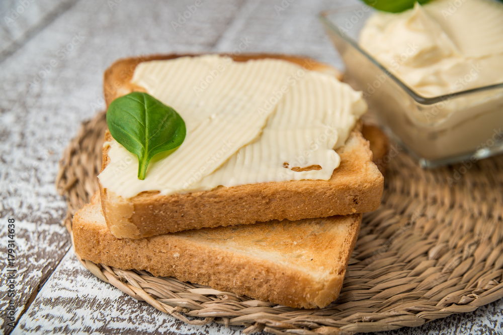 homemade appetizing crostini with soft cheese cream herbs