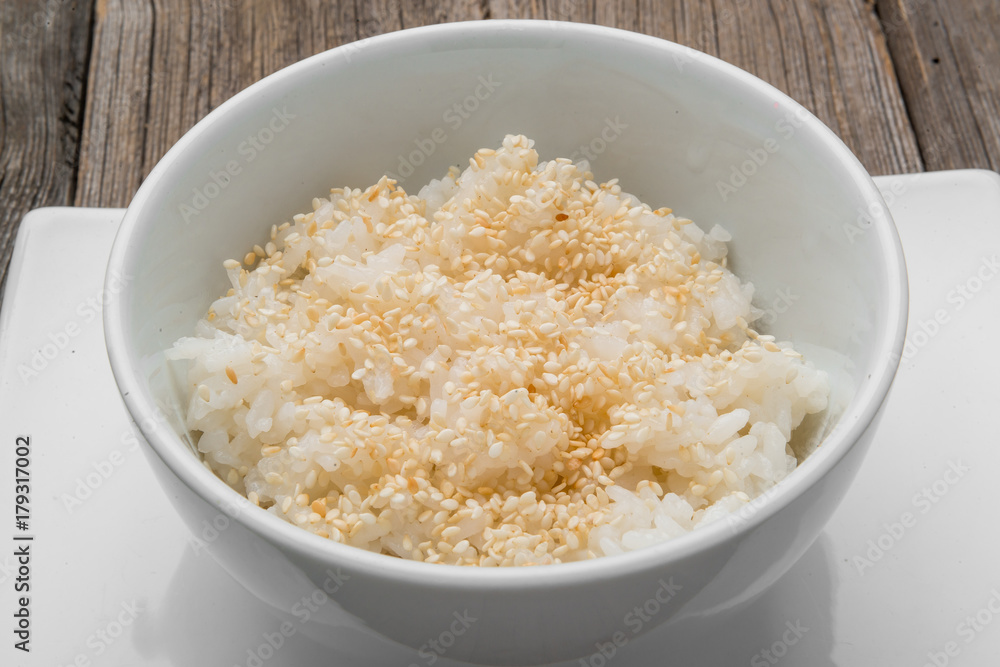 Japan rice and black sesame seeds with chopsticks