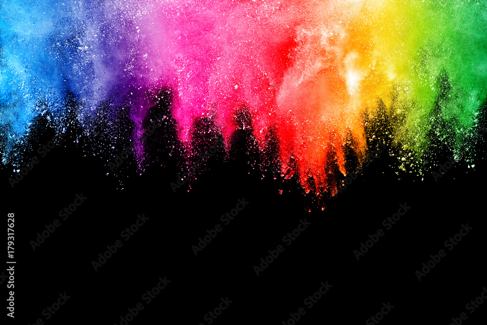 Freeze motion of colored powder explosions isolated on black background - obrazy, fototapety, plakaty 