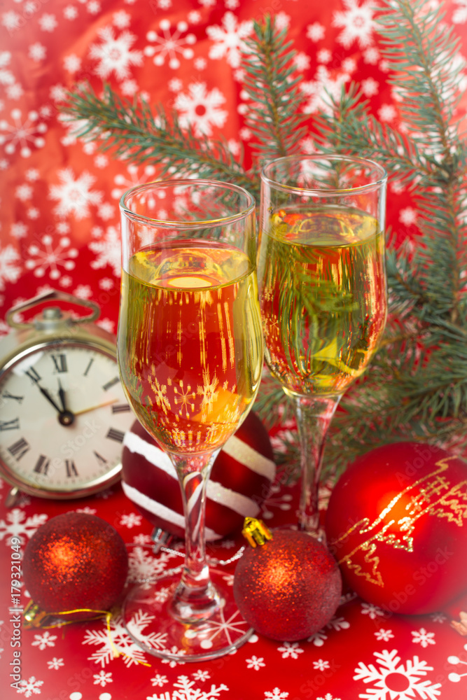 glasses of champagne and Christmas decorations glasses of champagne and Christmas decorations