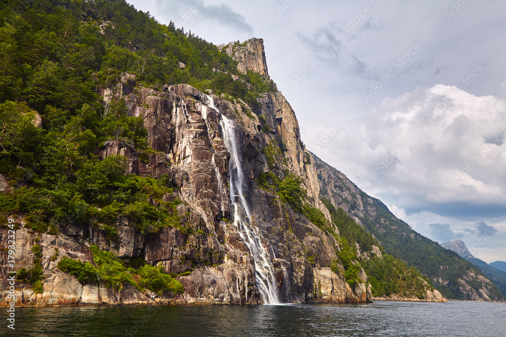 Wonderful waterfall  in the Norwegian fjord