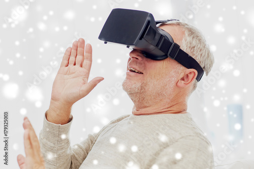 old man in virtual reality headset or 3d glasses