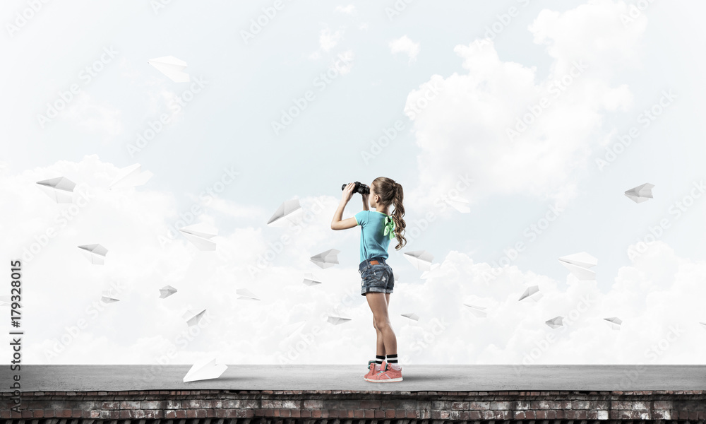 Concept of careless happy childhood with girl of school age look Concept of careless happy childhood with girl of school age look
