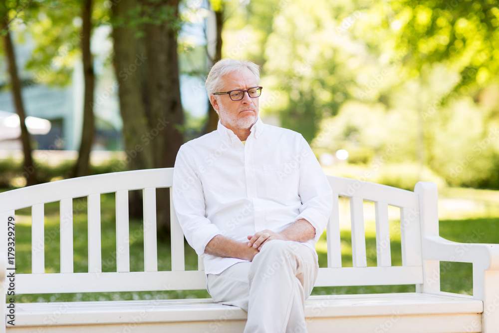Fototapeta premium sad senior man at summer park