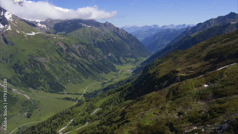 Wide aerial shot of mountain pass and valley / Grossglockner, Austria Wide aerial shot of mountain pass and valley / Grossglockner, Austria