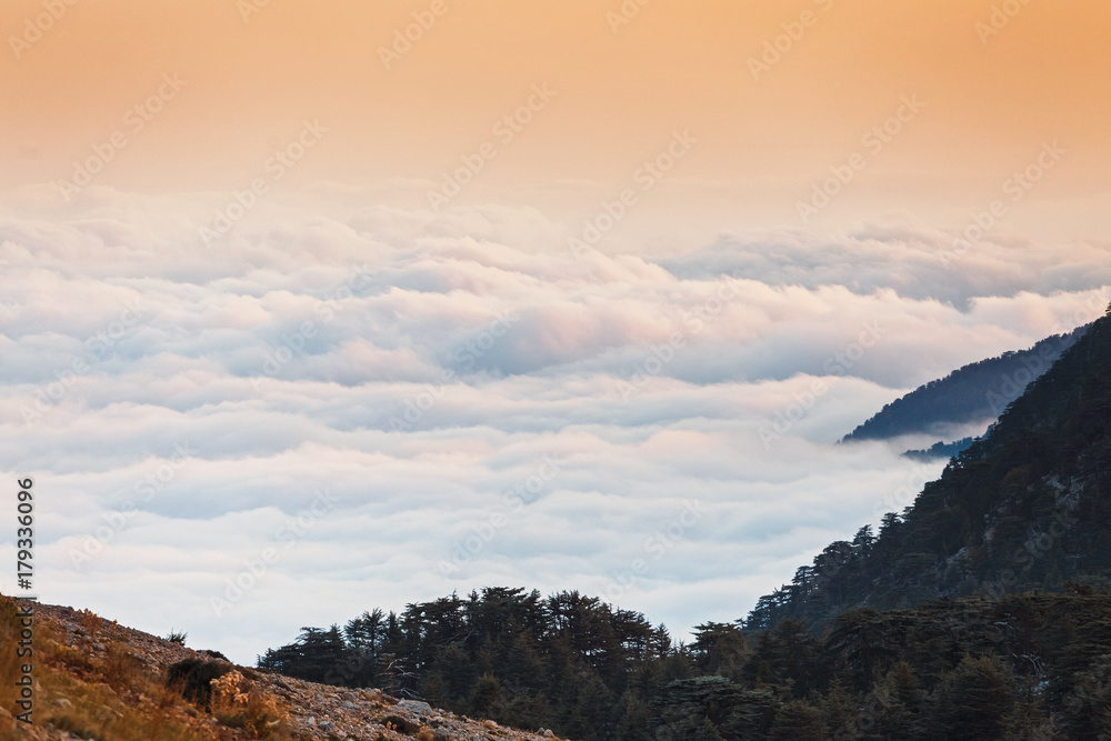 Majestic sunset in the mountains with fog and mist landscape, Turkey, Lycian Way near Tahtali peak
