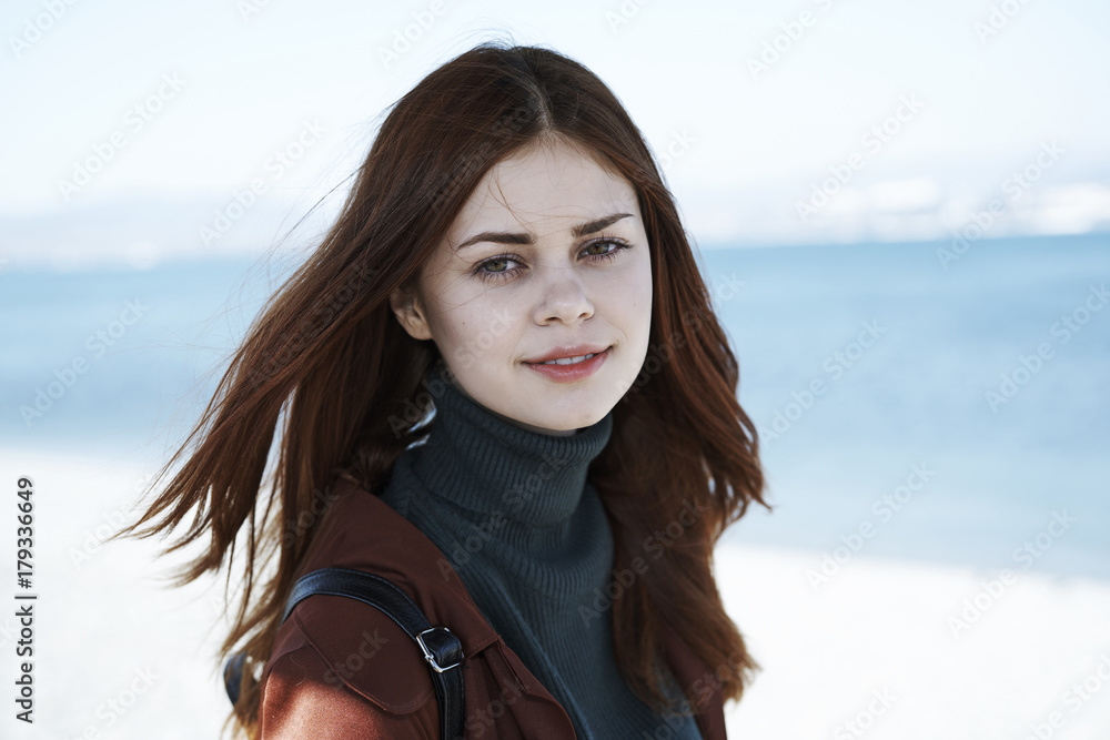 Wind blowing hair of Caucasian woman at beach Wind blowing hair of Caucasian woman at beach