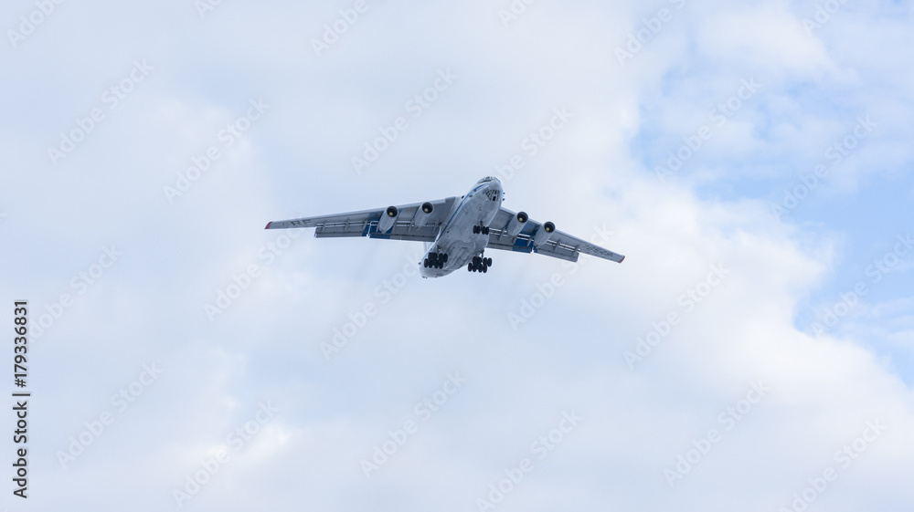 Tver, Russia - February 25, 2016: Teaching Russian cargo plane Ilyushin IL-76 MD RF-76549 landing in Migalovo, Tver. Tver, Russia - February 25, 2016: Teaching Russian cargo plane Ilyushin IL-76 MD RF-76549 landing in Migalovo, Tver.