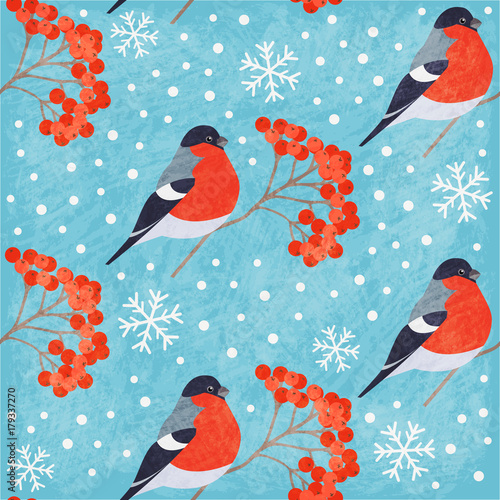 Winter vintage seamless pattern with bullfinch, rowan and snowflakes on blue background. Shabby texture. Vector illustration