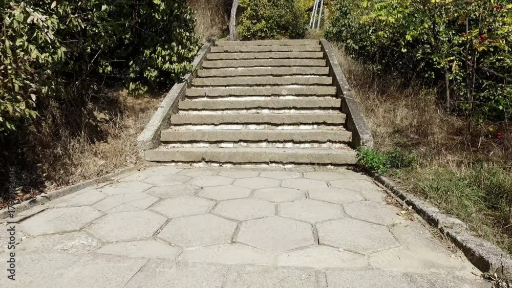 Climbing, walking up the concrete stairs in nature POV Climbing, walking up the concrete stairs in nature POV