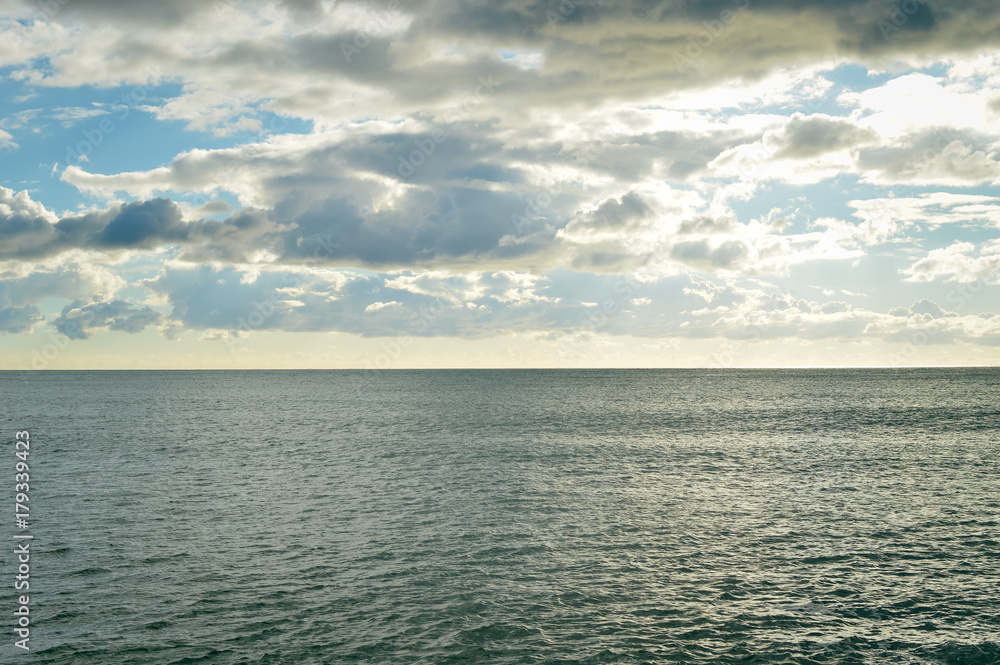 Defocused blurry beautiful sea coastline sun rays light outdoors natural background. Recreational tourism inspirational scenery photograph Defocused blurry beautiful sea coastline sun rays light outdoors natural background. Recreational tourism inspirational scenery photograph