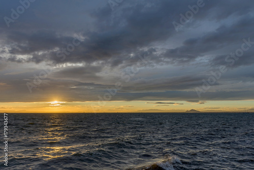 Sunset in the sea after a thunderstorm. La Manga. Spain.     © kamira