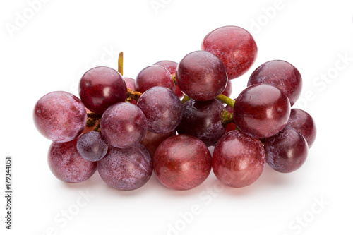 Ripe red grape isolated on white.