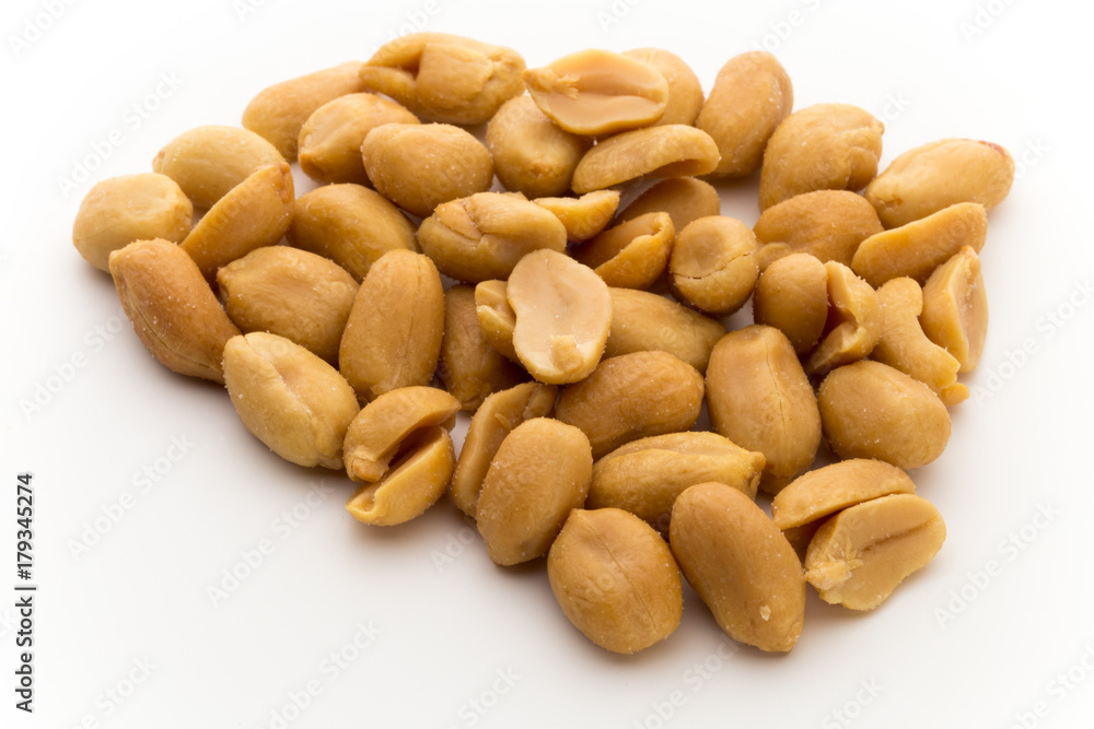 Peeled peanuts on the isolated background. Peeled peanuts on the isolated background.