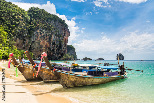 Amazing view of beautiful beach with longtale boats. Location: Railay beach, Krabi, Thailand, Andaman Sea. Artistic picture. Beauty world. © olenatur