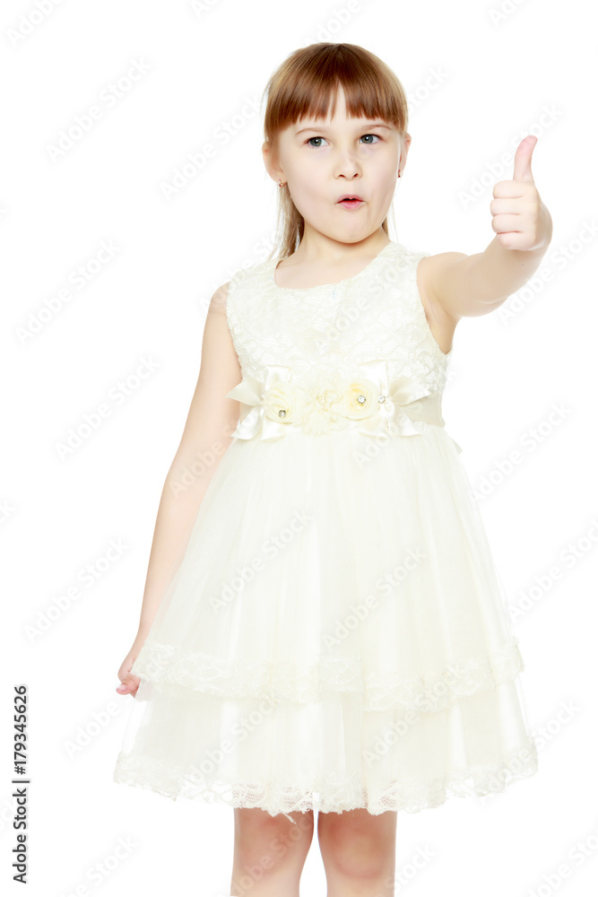 Little girl holding her thumb up Little girl holding her thumb up