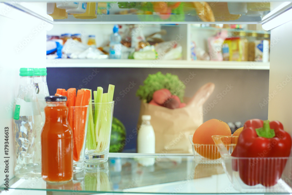 Open refrigerator with fresh fruits and vegetable. Open refrigerator Open refrigerator with fresh fruits and vegetable. Open refrigerator