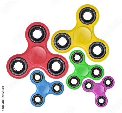Group of fidget colorful Spinners, isolated on a white background