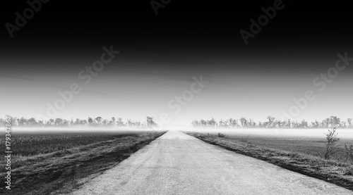 Dramatic road into horizon background © spacedrone808