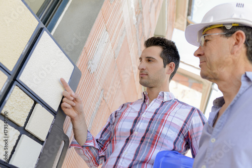 Architects choosing colour scheme for housing project