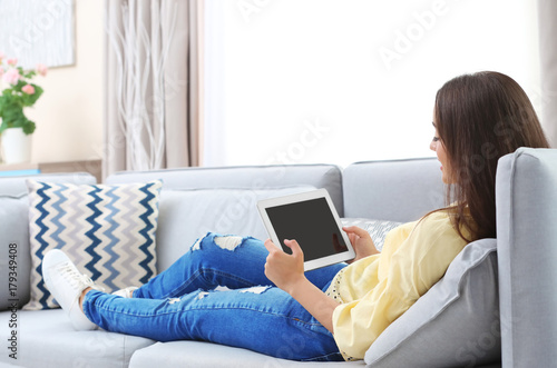 Young woman using tablet co...