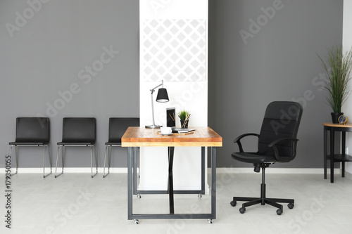 Interior of modern room with comfortable workplace © Africa Studio