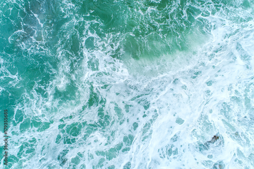 the surface of the water, turquoise in color with bird's eye the surface of the water, turquoise in color with bird's eye