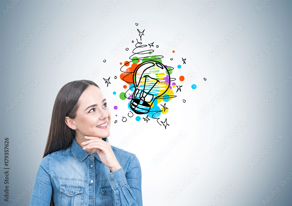 Fototapeta premium Cheerful young woman in a jeans shirt, idea