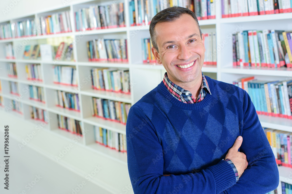 Portrait of middle aged man in library Portrait of middle aged man in library