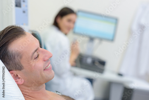 man undergoing chest examination