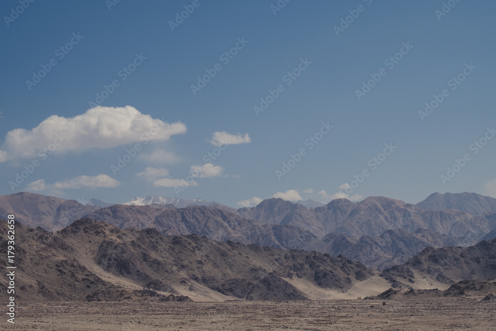 Landscape image of mountains and blue sky background in Ladakh , India