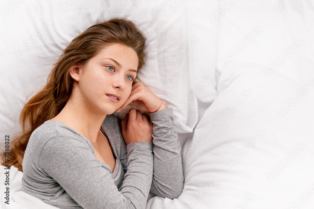 young Woman dreaming in bed young Woman dreaming in bed