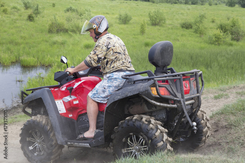 Tourists on all-terrain vehicles. On ATV
