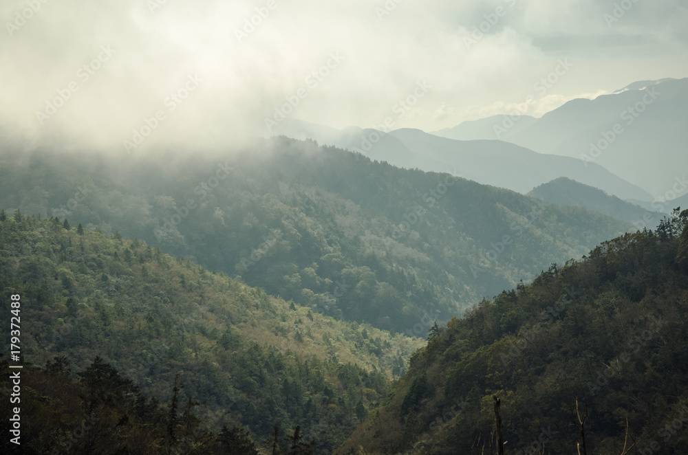 High mountain in mist and cloud