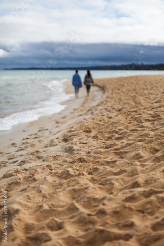 2 females on beach walk