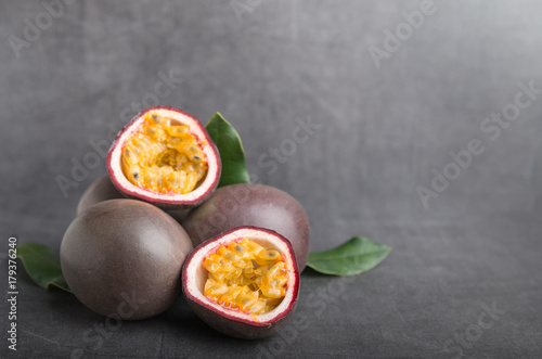 passion fruit on a grey stone table