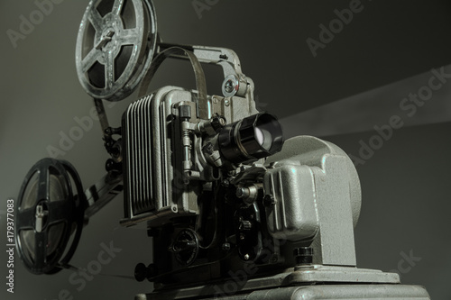 Old cinema projector on a dark background