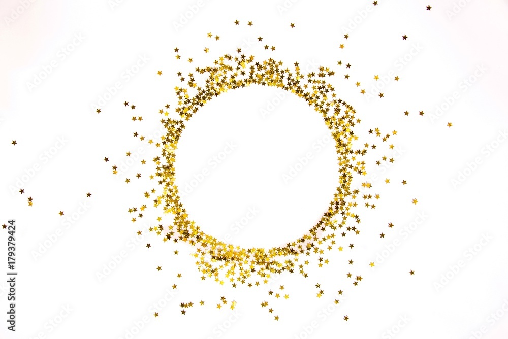 Star shaped golden sequins frame arranged in circle.