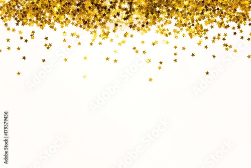 Obraz na płótnie Star shaped golden sequins background. Copy space. w salonie