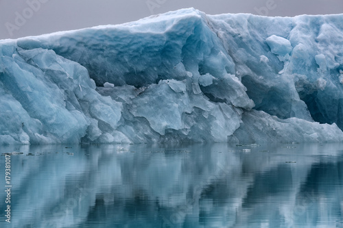 Iceberg Reflecting in The Water