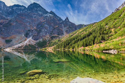 Fototapeta Naklejka Na Ścianę i Meble -  Stunning dusk at pond in the Tatra Mountains in autumn
