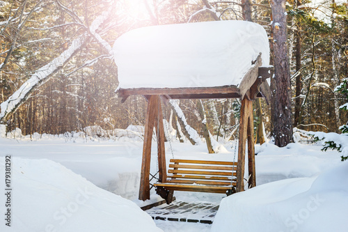 Wallpaper Mural Wooden swing in the snow Torontodigital.ca