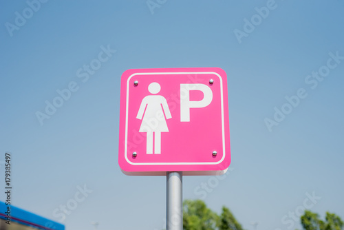 women parking symbol