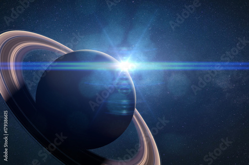 Fototapeta Naklejka Na Ścianę i Meble -  intense sunrise over the planet Saturn