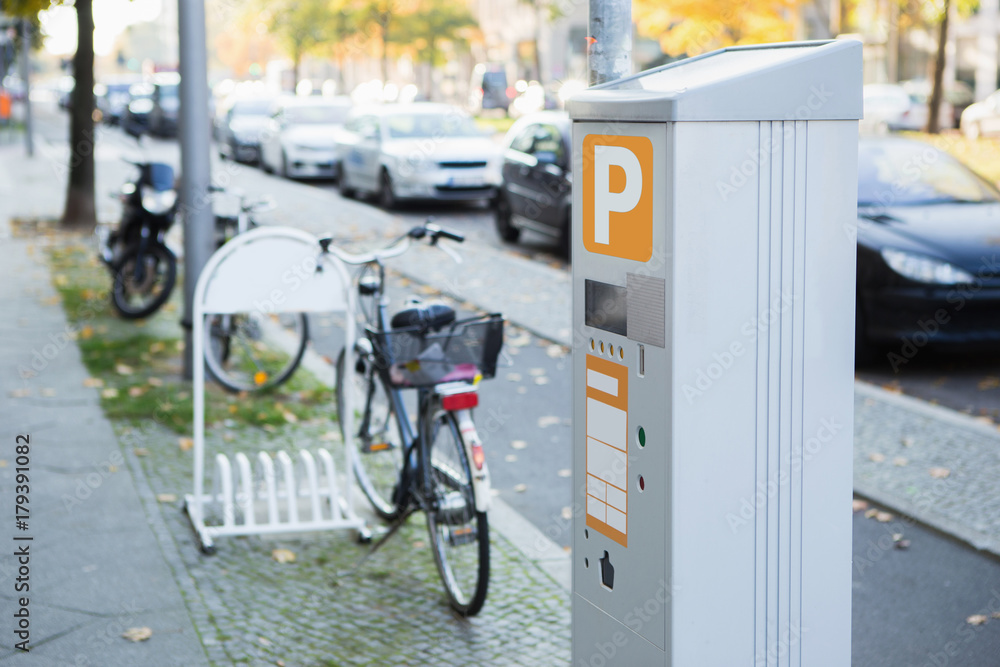 Parking machine with solar panel in the city street. Pay On Foot Parking System Parking machine with solar panel in the city street. Pay On Foot Parking System