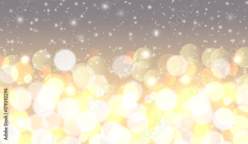 Christmas background, golden blurred lights, snowflakes and glittering bokeh 