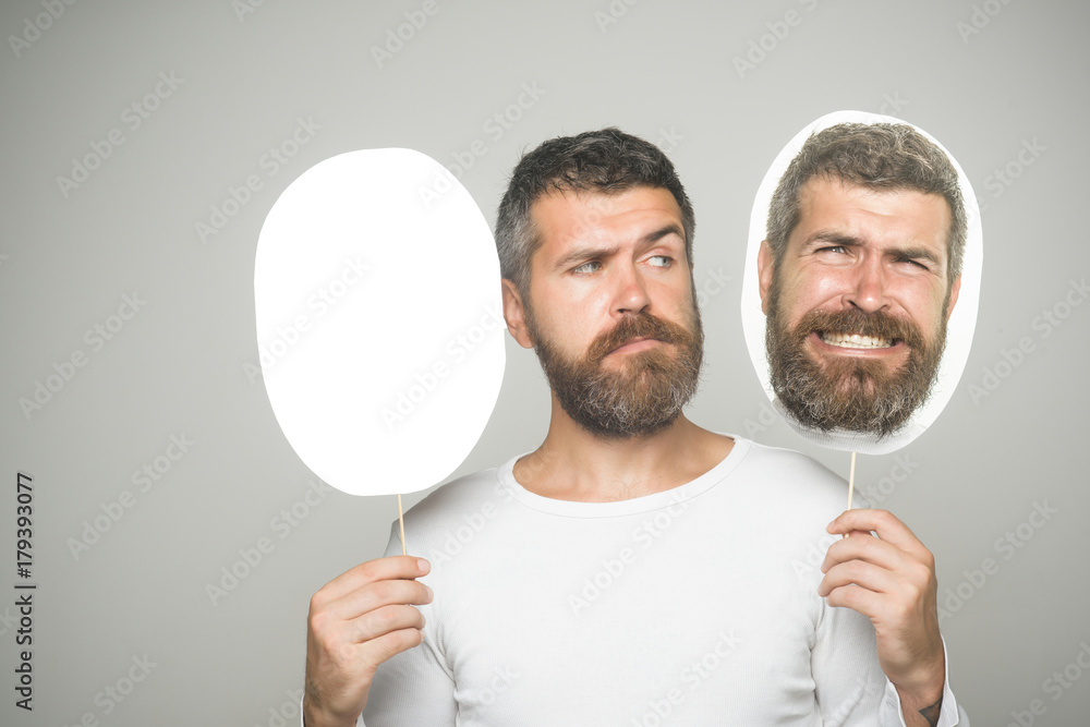 Hipster with sad face hold portrait nameplate. Hipster with sad face hold portrait nameplate.