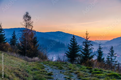 Fototapeta Naklejka Na Ścianę i Meble -  Ukrainian Carpathian Mountains landscape background during the sunset in the autumn season