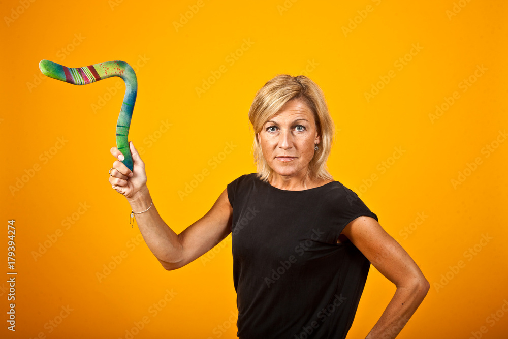 woman posing with a boomerang woman posing with a boomerang