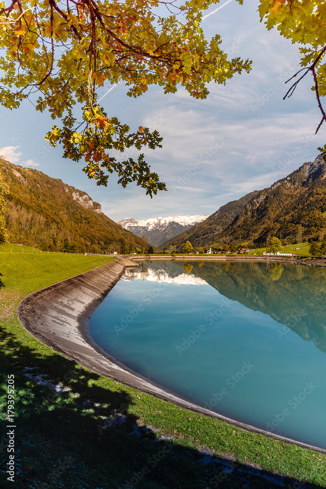 Beautiful reservoir in switzerland in autumn - obrazy, fototapety, plakaty 